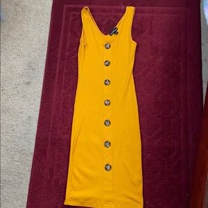 A midi button bodycon dress